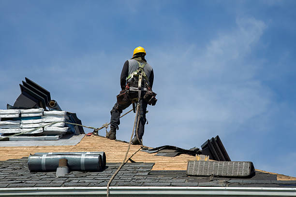 Professional Roofing technician working in Trumbauersville, PA